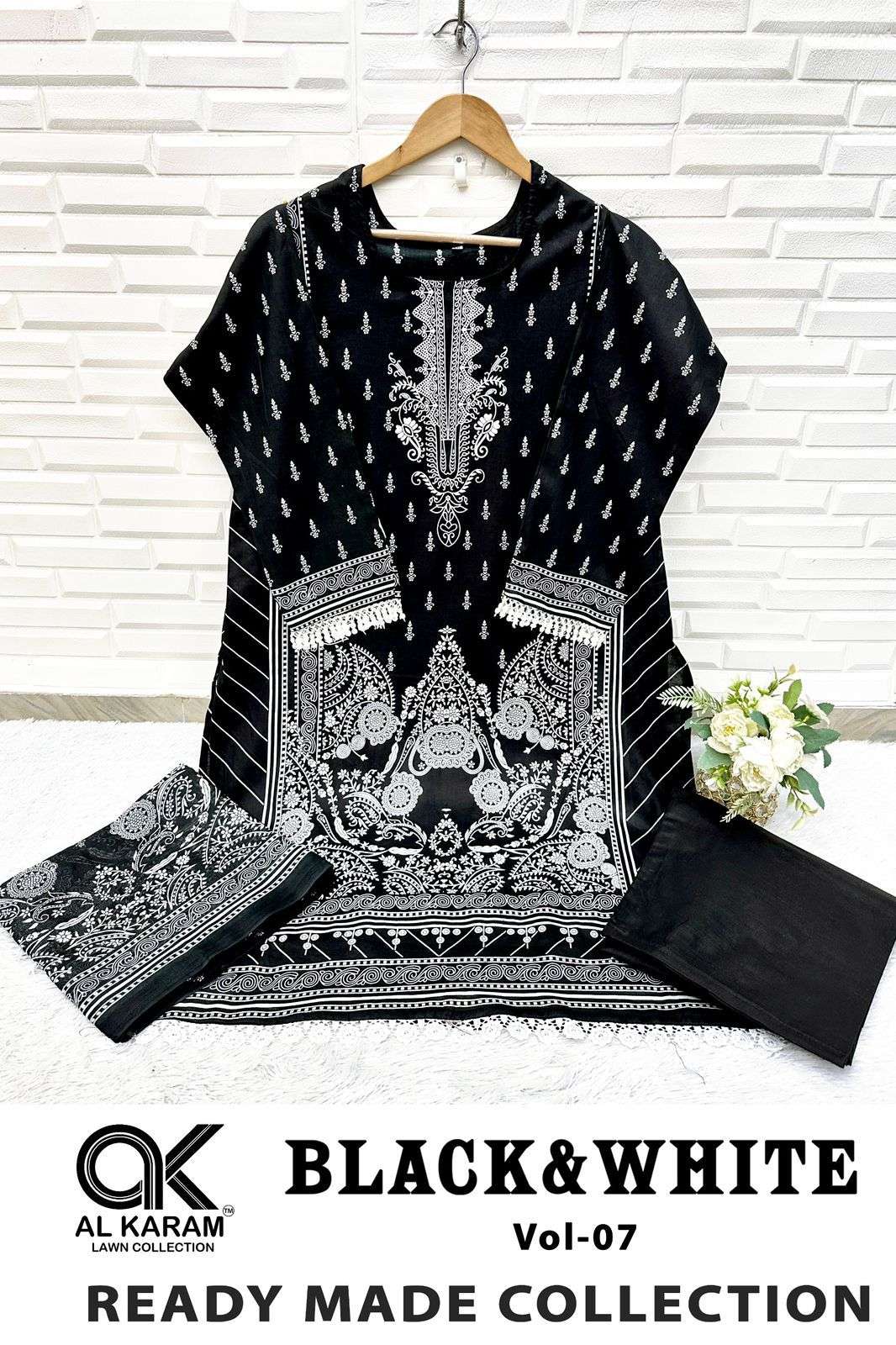 BLACK AND WHITE STICH SUITS READY WEAR BY AL KARAM-05